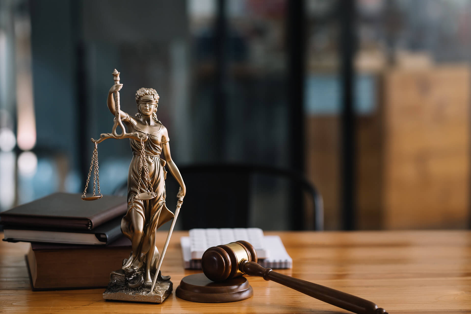 statue-of-lady-justice-on-desk-of-a-judge-or-lawye-SVECXT5.jpg